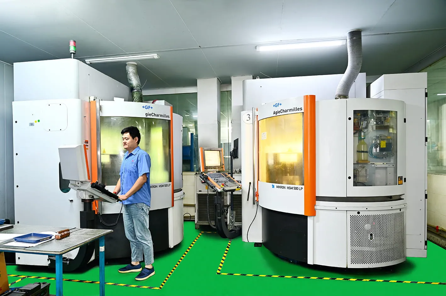 High-speed CNC machining center cutting precision components in our machining workshop