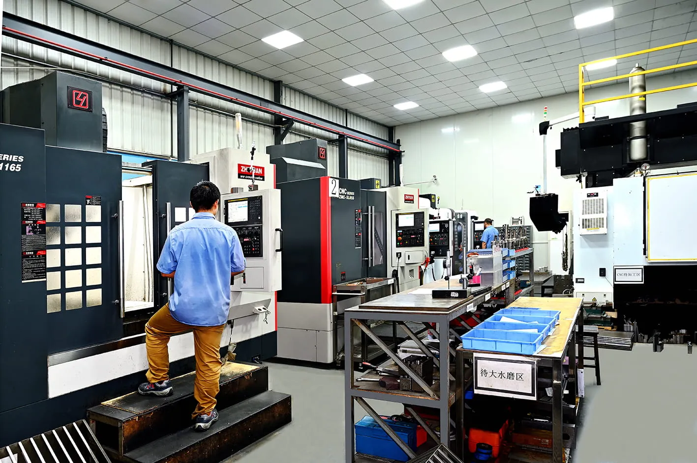 CNC machining center cutting mold steel in the tooling shop
