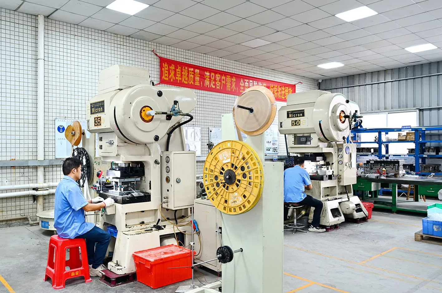 High-speed stamping press running metal inserts