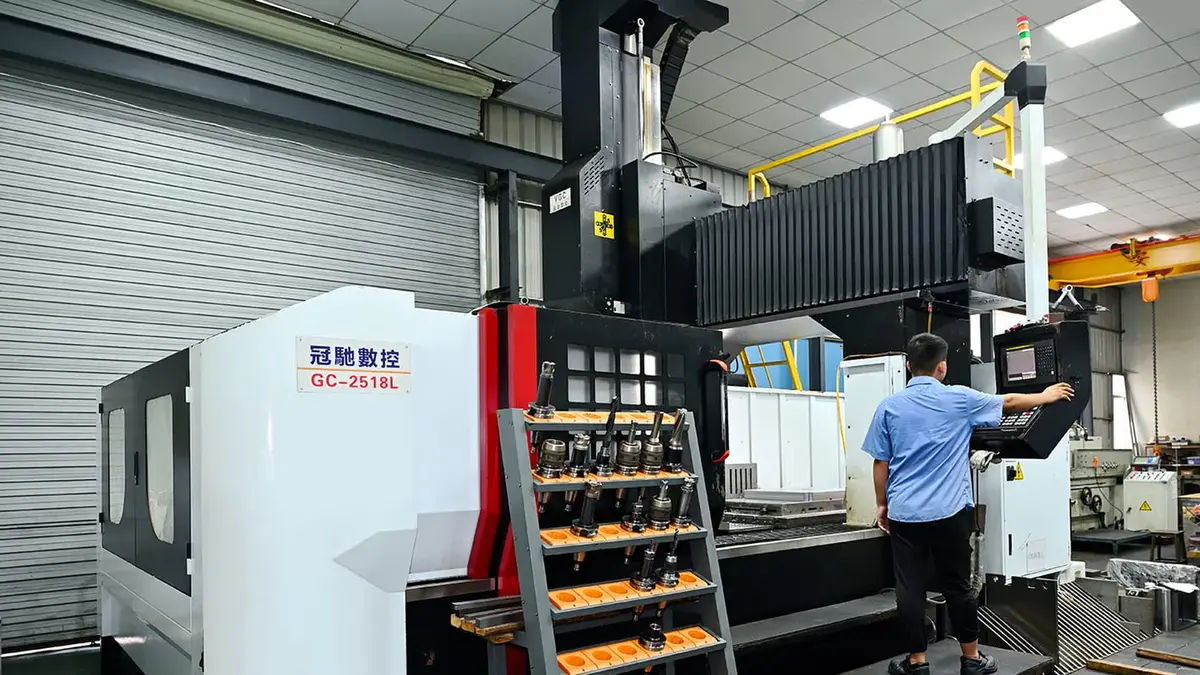 Gantry CNC machining center with tool magazine