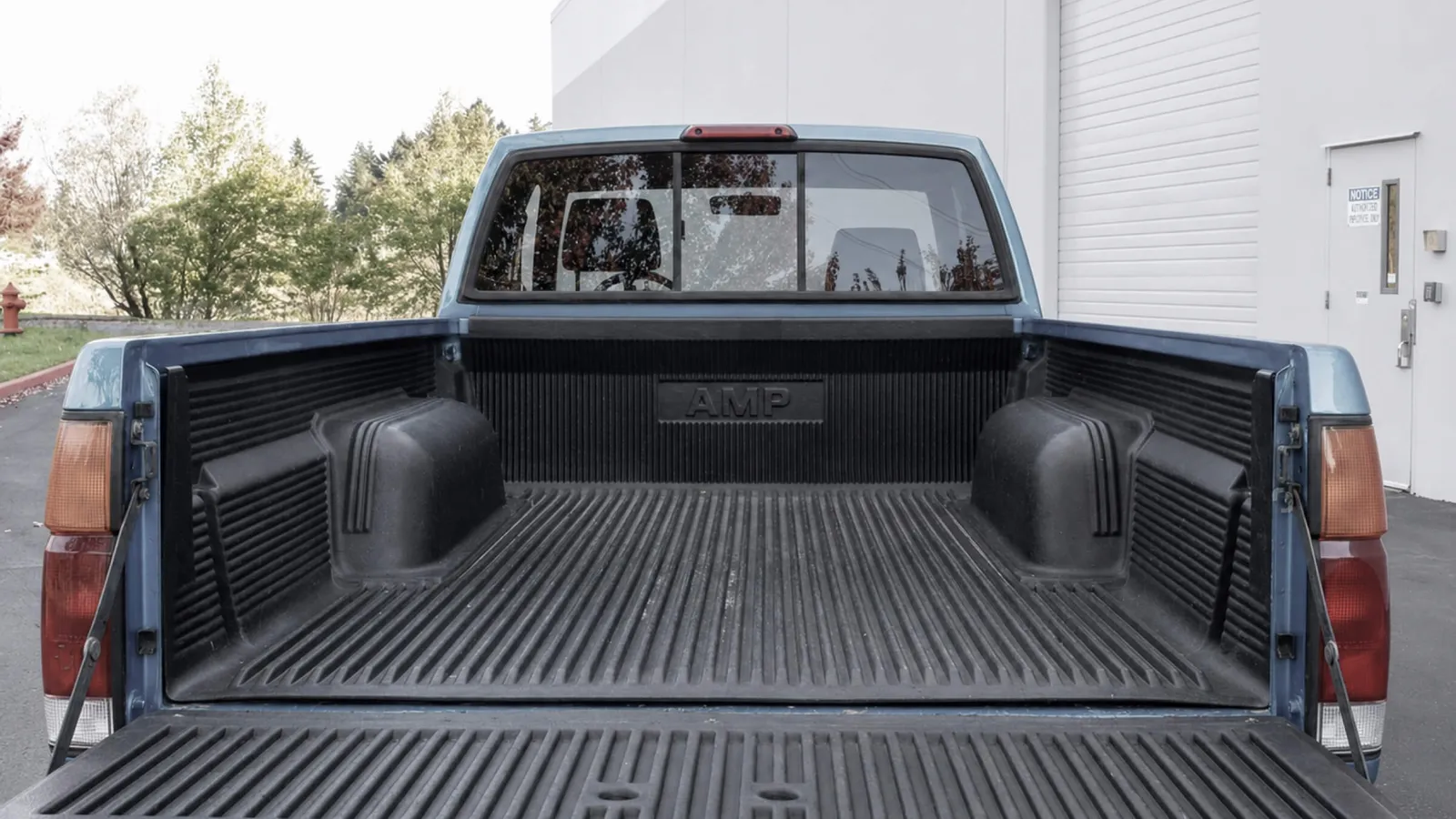 Full-size molded automotive components staged for shipment