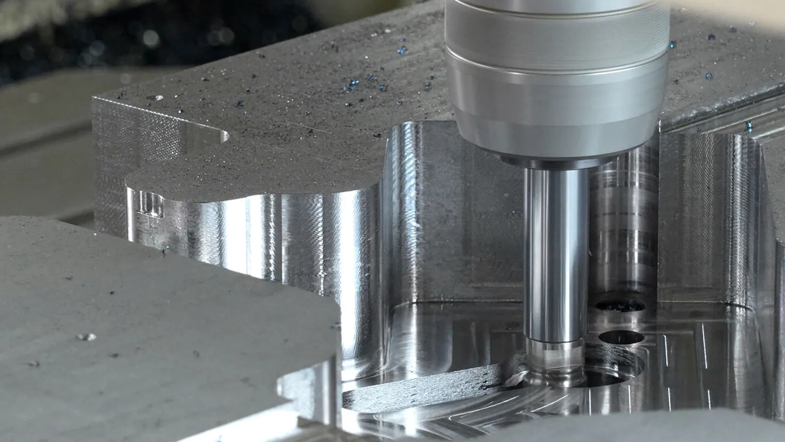 Tool-room CNC machine finishing a mold insert