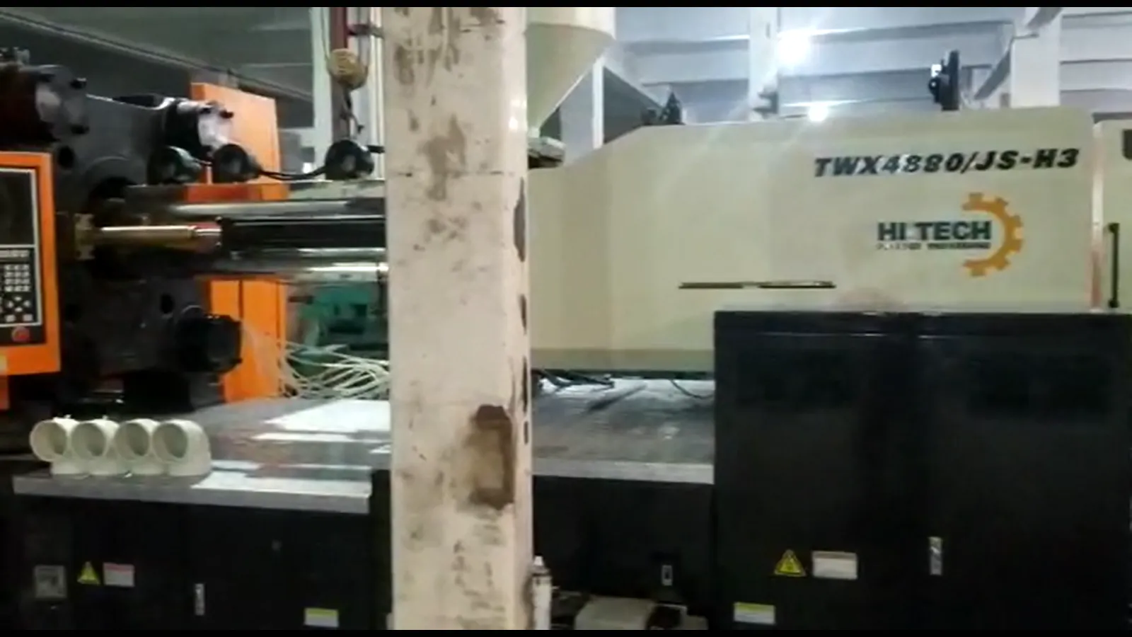 Horizontal HI-TECH injection molding press used for two-shot programs